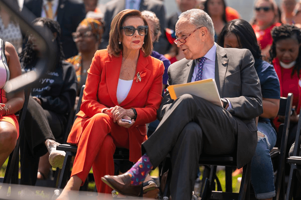 House Speaker Nancy Pelosi talks with Senate Majority Leader Chuck Schumer during the Moms Demand Action Gun Violence Rally on June 8, 2022, in Washington, DC. Nathan Howard/Getty Images